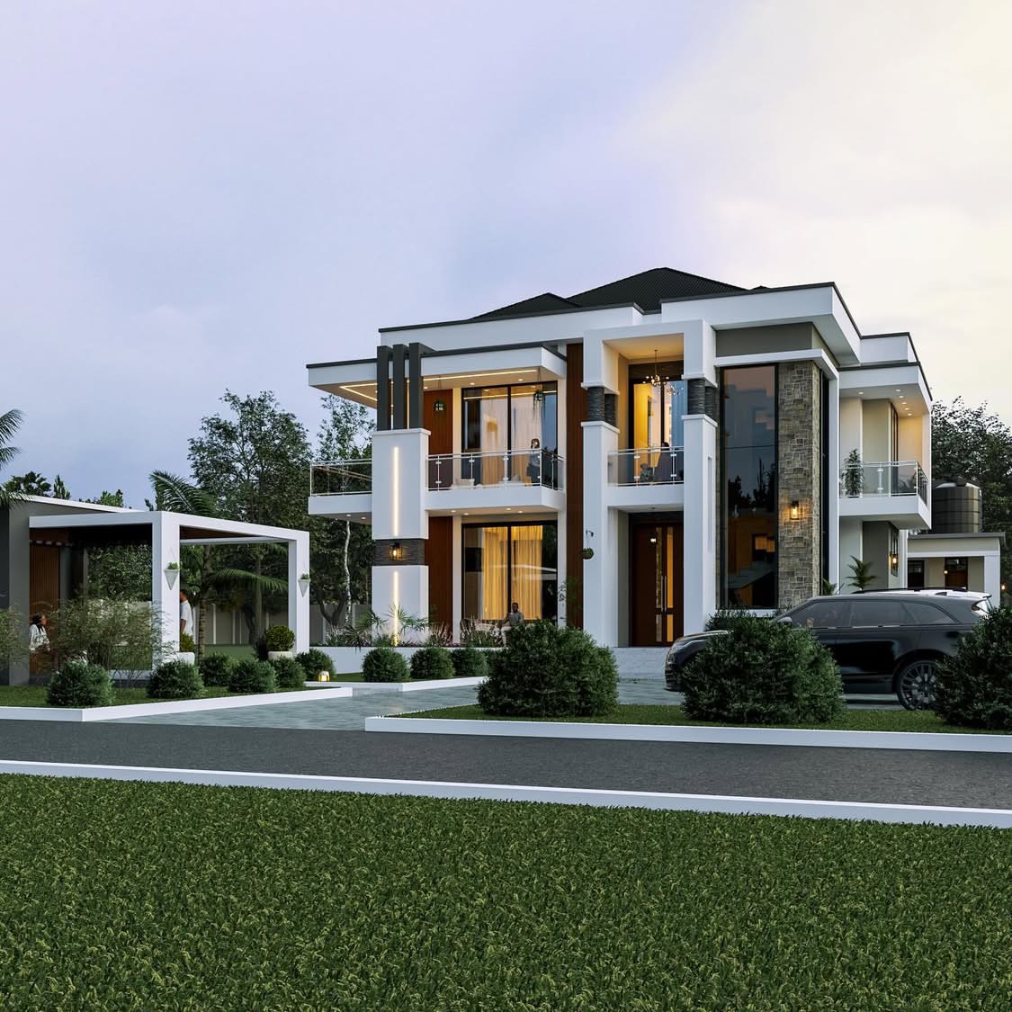 Two-storey white residence at dusk with stone and timber columns, warm interior lighting, a garden pavilion and cars in the driveway