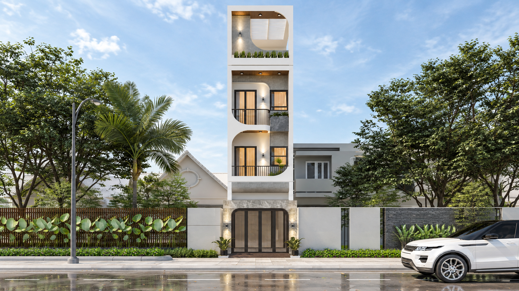 Slim four-storey white townhouse with curved balcony openings, timber soffits and a rattan gate, framed by palms
