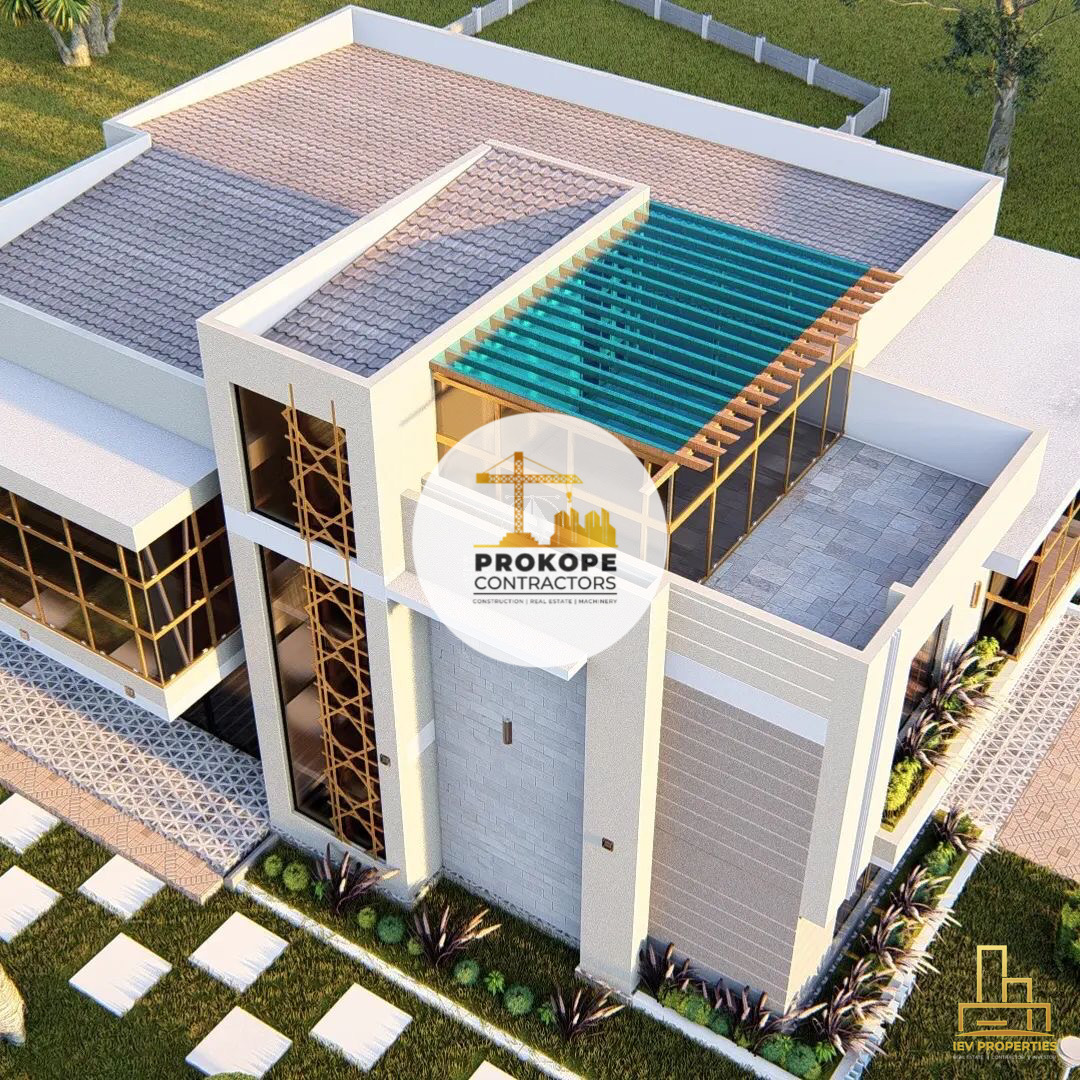 Aerial view of a modern cream building with tiled roofs, a timber pergola over a paved roof terrace and planted borders